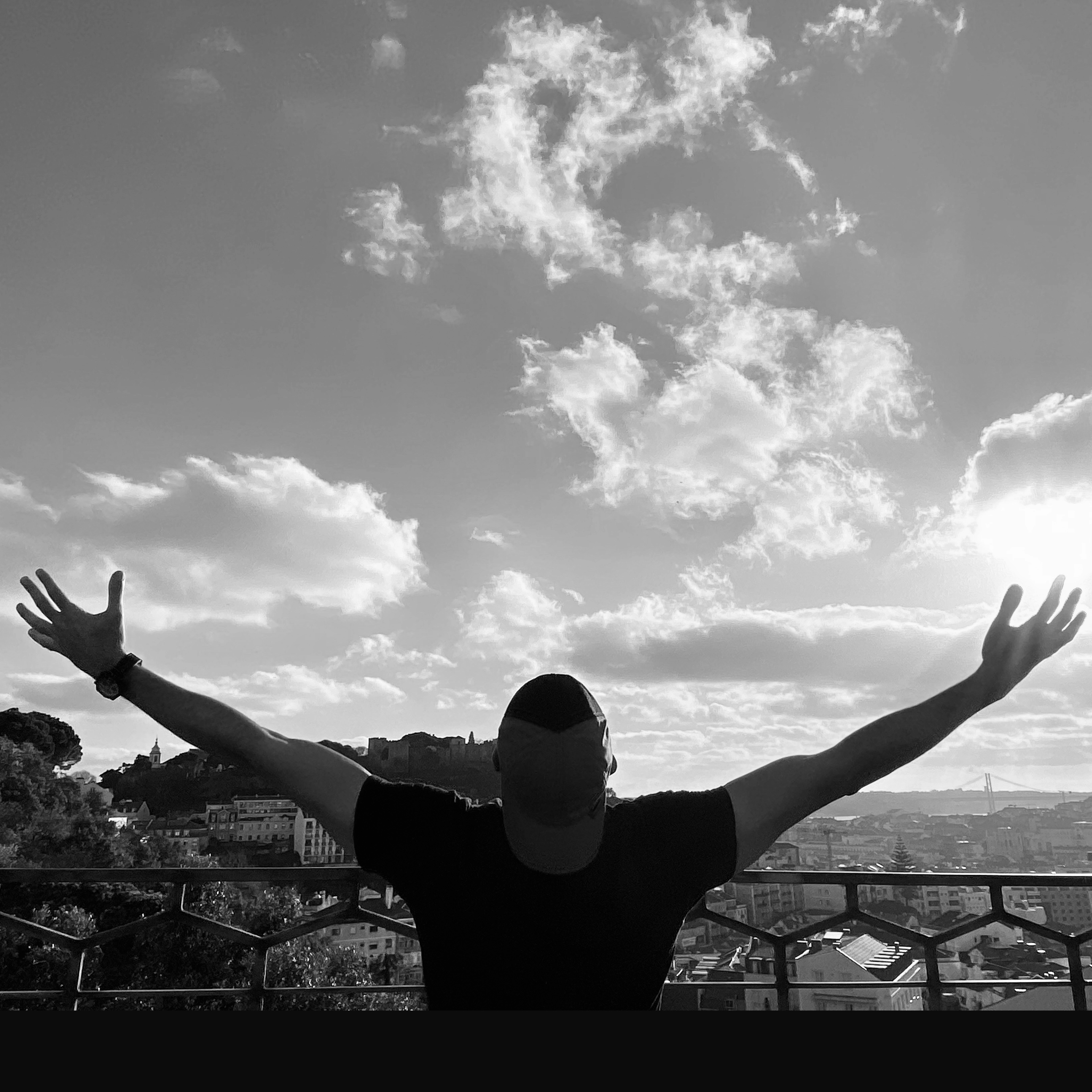 Ben Fahimnia with arms raised